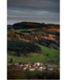 Village et collines du Livradois-Forez sous un ciel gris