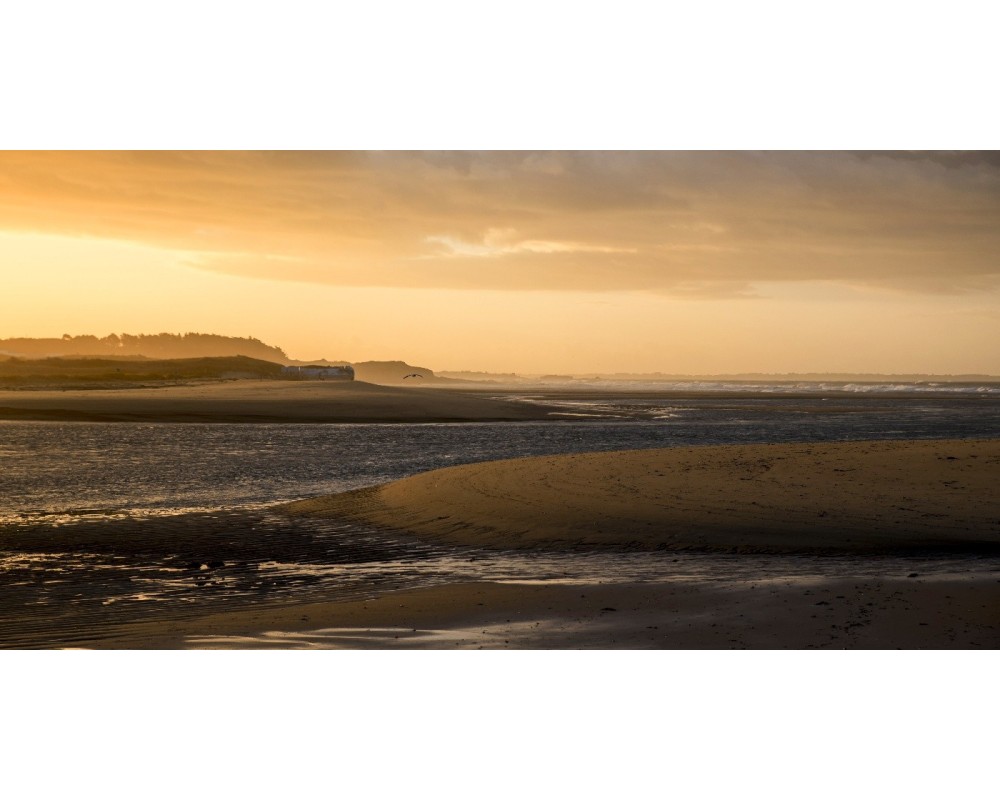 Coucher de soleil doré sur la plage du Pouldu