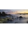Kerfany au coucher du soleil, mer lisse et rochers