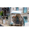 Île de Sein — terrasse ombragée et détails pittoresques d'une ruelle