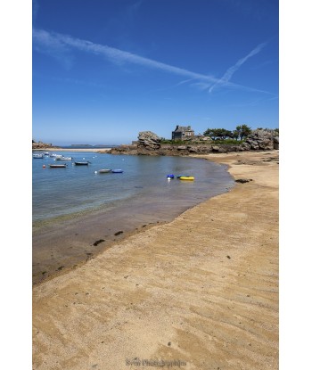Plage de sable et barques...