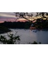 Port de Merrien au lever du jour, ciel rosé et bateaux